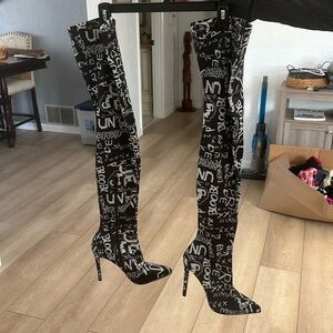 Woman’s thigh high boots